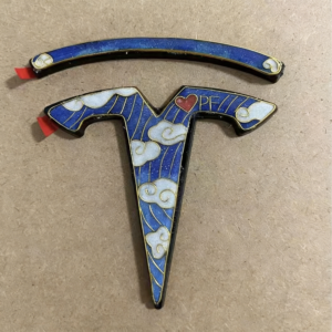 Tesla Badge